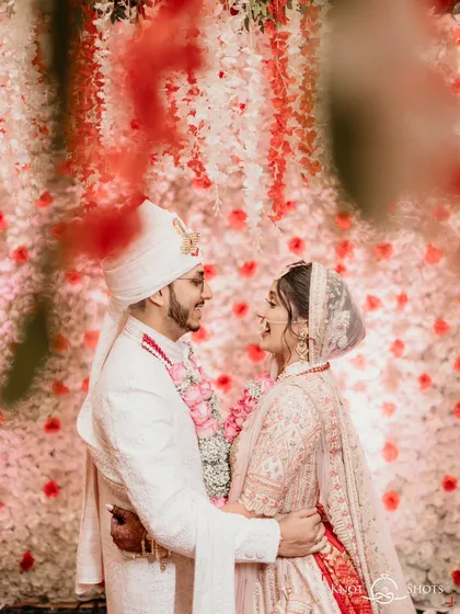 An intimate moment against a backdrop of flowers. I look for these opportunities to create romantic couple portraits that feel both grand and personal.