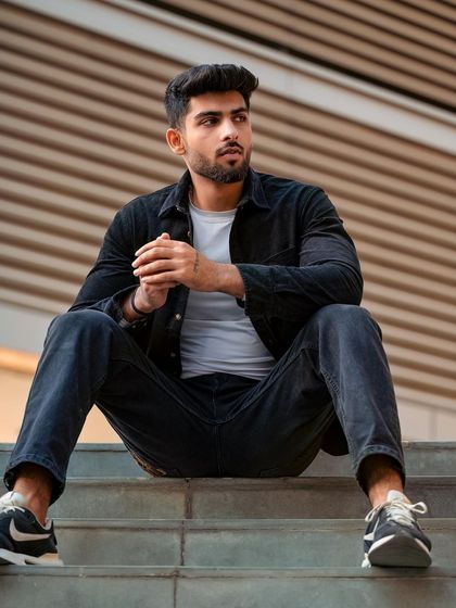 Another angle from the same location, this image provides a different look at the model's pose and the urban environment. We aim to deliver a range of options from every shoot.