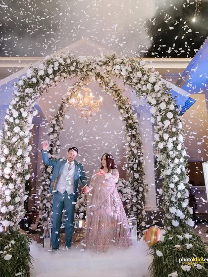 The pure joy of a grand entrance. We use techniques like confetti showers and dramatic lighting to capture the energy and excitement of your reception, making for unforgettable, dynamic photographs.