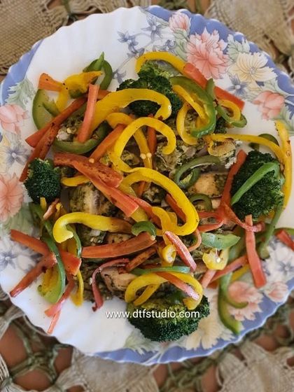 A recipe for a delicious Grilled Chicken Salad, perfect for those aiming for washboard abs. It's high in protein and packed with fresh vegetables.