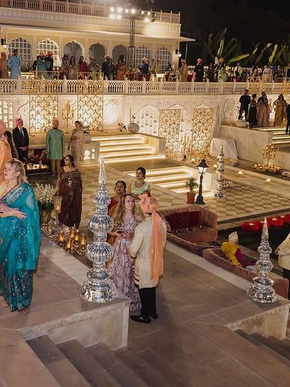 Guests enjoying the pheras ceremony from the tiered seating around the Hathi Kund. The layout was designed to give everyone a perfect, unobstructed view of the central mandap.