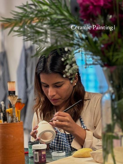 A simple, elegant image promoting our ceramic painting sessions.