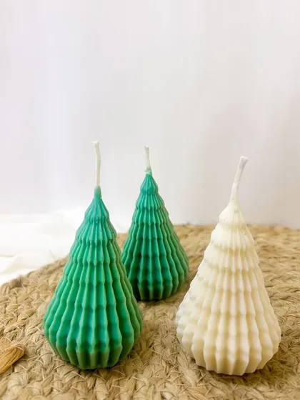 Introducing our new Spiky Christmas Tree candles in both green and white. A modern take on a classic holiday symbol.