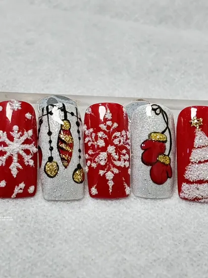 A beautiful red, white, and silver Christmas set featuring textured snowflakes, glittery ornaments, and cozy mittens.