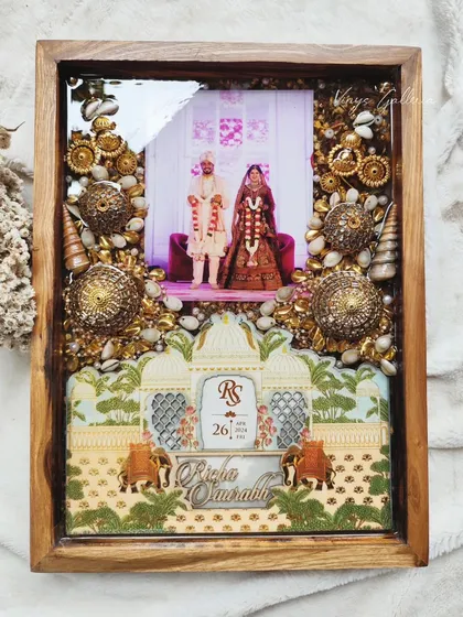It's an honor to preserve sacred traditions. This piece was my first time preserving Kaleras, along with a wedding card and varmala flowers, inside a rich teakwood frame. Every element tells a story, creating a memory for my client Richa that will last a lifetime.