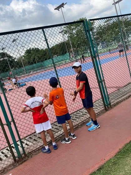 Our Under-10 players watching a match. Learning by observing is a key part of their development as they cheer on their teammates.