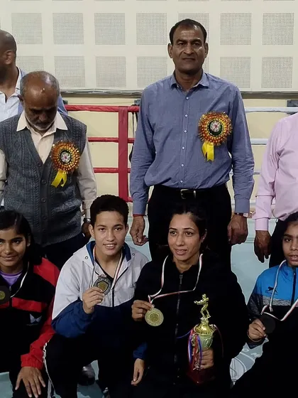Our female boxers proudly displaying their medals and trophy at the Delhi State Boxing Championship in 2023. We have a strong team of women fighters who consistently perform at the top level.