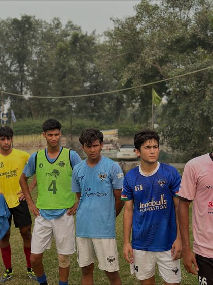 Young players lined up during a training day, showing the focus and discipline instilled in them from the start.