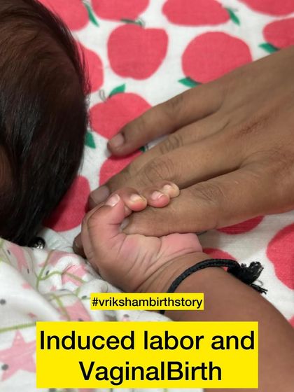 This beautiful photo of a baby's hand holding a finger represents the successful end of an induced labor and vaginal birth journey, supported by knowledge and trust.