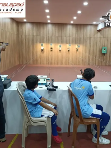 An instructor guides a young participant during our summer camp. With a mix of individual coaching and group activities, we ensure every child has a productive and enjoyable time.