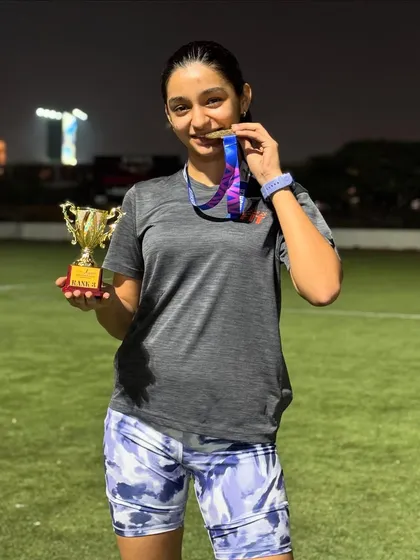 Aayra celebrating her Bawa Juniorthon trophy and medal. This is the result of consistent training and a competitive spirit.