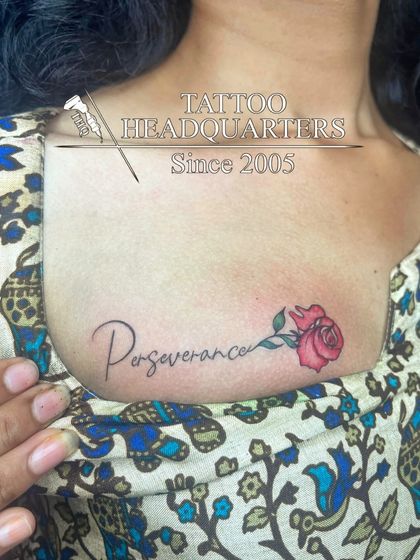 The word "Perseverance" in script, with a red rose growing from the end, symbolizing beauty that comes from endurance.