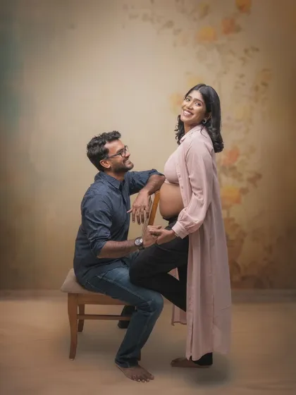 The joy in her smile says it all. This is a candid, lighthearted moment captured in the studio. My aim is to make couples feel so comfortable that their genuine laughter and affection shine through.