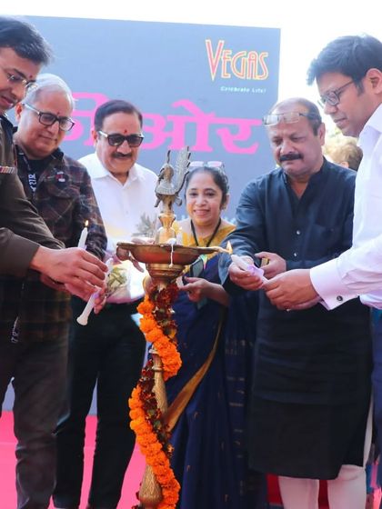 The lamp lighting ceremony with our chief guests, a tradition that marks an auspicious beginning.