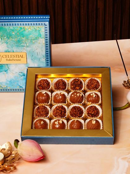 A beautiful Rakhi gift box filled with our assorted chocolate truffles. It’s a modern, indulgent way to celebrate a timeless bond.