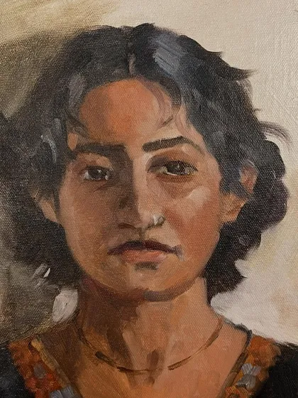 A close-up detail of Anamaya's finished portrait. I focused on capturing her direct gaze and the subtle shifts in skin tone under the studio lighting.