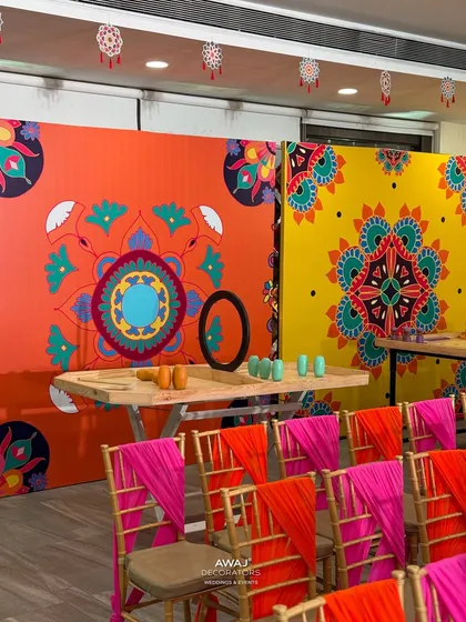 A fun and games area at the Mehendi, with colorful backdrops and traditional Indian game setups.