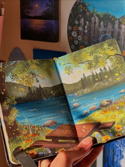 Another shot of the picnic painting, held up in my studio. The details of the trees and the water create a lovely sense of depth.