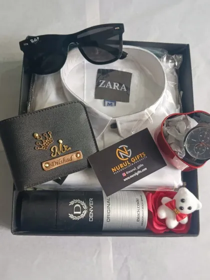 This all-in-one gift hamper is perfect for a birthday, featuring a personalized wallet, a white shirt, sunglasses, a watch, deodorant, and other small keepsakes.