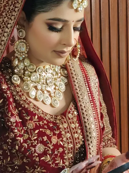 A candid moment captured. Even when she's not looking at the camera, her makeup looks flawless from the side profile.