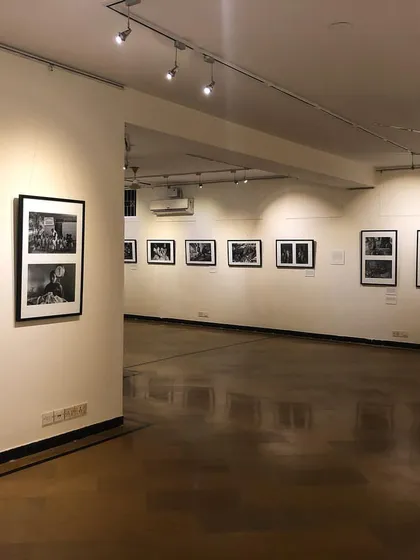 The layout of the gallery allows for both individual contemplation and group viewing. This image shows how we utilize corners and walls to create distinct sections within a single exhibition.