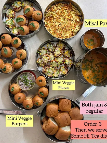 I love catering to families with diverse tastes. This hi-tea order included a mix of Jain and regular dishes like Mini Veggie Pizzas, Mini Veggie Burgers, and Misal Pav, so everyone had something delicious to eat.