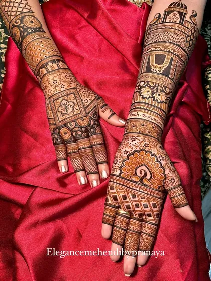 I love the challenge of creating two unique yet complementary designs for a bride. This set features a traditional peacock motif on one hand and a geometric pattern with lotus details on the other, both extending up the arm for a complete bridal look.