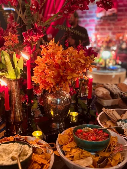 A closer view of our 'Night in Brooklyn' setup, featuring an array of gourmet dips, salsas, and chips. We focus on abundance and variety, ensuring there's a delicious bite for every guest.