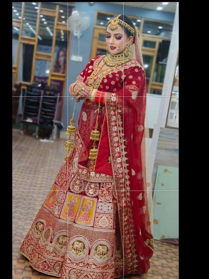 Another view of this stunning red bridal rental lehenga, showing the full flare and intricate work on the skirt. It’s a regal choice that ensures you are the center of attention.