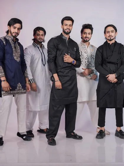 Another group shot showing the diversity of my ethnic wear. Notice the different collar styles, embroidery patterns, and silhouettes, all tailored to fit each individual perfectly.