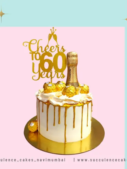 Cheers to 60 years! This celebratory cake features a gold drip, a miniature champagne bottle, and Ferrero Rocher chocolates. It’s a fun and festive design to honor a remarkable 60th birthday milestone.