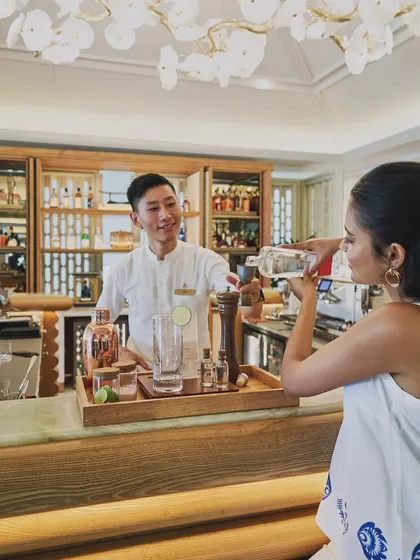 Who doesn’t love to make their own gin? This shot from the St. Regis Goa showcases one of their signature experiences, capturing the interaction between the guest and the bartender in a beautiful, bright setting.