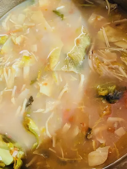A light tomato curry cooked with banana flower and a little bit of dried fish.