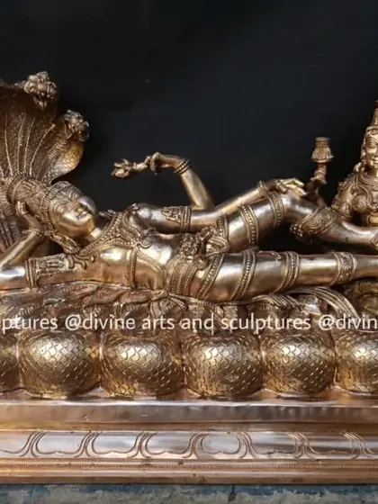 We were inspired to create this unique sculpture of Lord Ranganathar, a form of Vishnu in repose, resting upon the serpent Adishesha. This 22-inch long Panchaloha piece captures a moment of cosmic tranquility and divine grace, a testament to the narrative power of Chola bronze art.