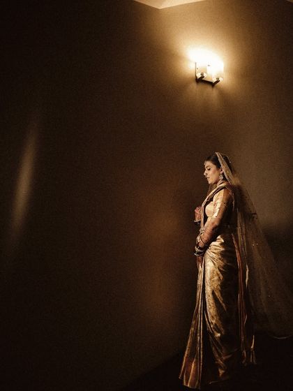 A dramatic and moody bridal portrait. I used minimal lighting to create a sense of timelessness and artistry, with the bride looking like a figure from a classic painting.