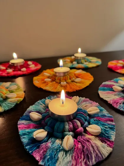 Light up your celebrations with my handmade macrame tea light holders. These were made for Diwali, featuring vibrant, colorful threads and cowrie shells, adding a warm, festive glow to any space.