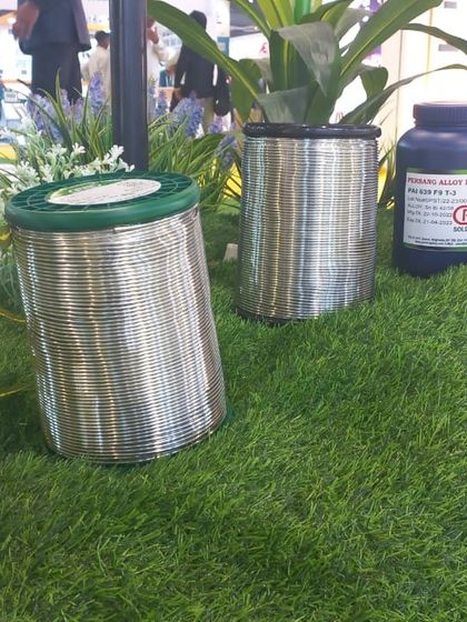 A look at the raw materials of lighting manufacturing, featuring spools of solder wire essential for electronics assembly.