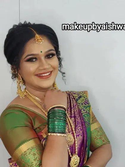 The best part of my job is seeing a happy bride. This client is glowing in her traditional South Indian wedding attire, with makeup that enhances her natural features and a smile that says it all.