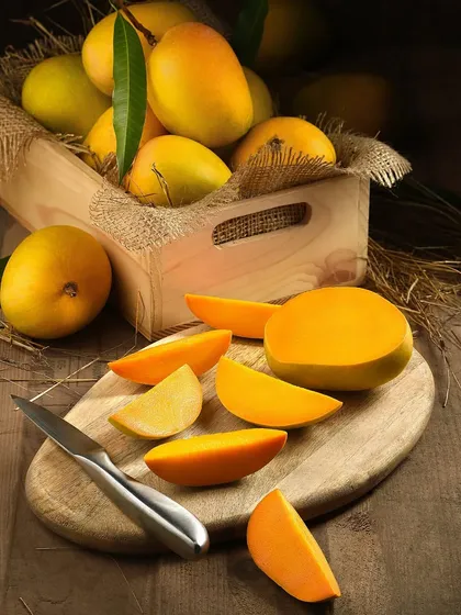 Nothing says summer like mangoes. For this shot, I used warm, directional lighting to emphasize the rich color and juicy texture of the fruit, creating a classic, appetizing food portrait.
