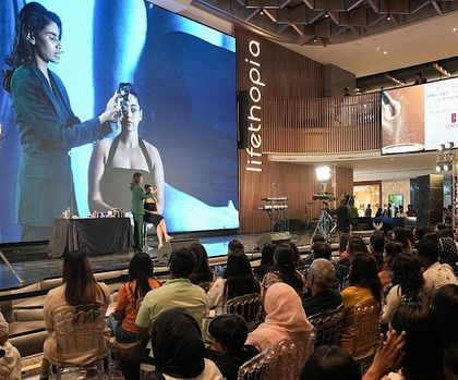 A wide shot of my masterclass in Bengaluru, with my live demo projected on a huge screen. I love connecting with large audiences and sharing my knowledge.