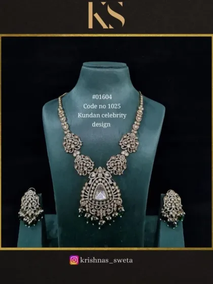 The all-white and green version of the Kundan celebrity set. The oxidized finish and green drops give it a classic, vintage appeal.