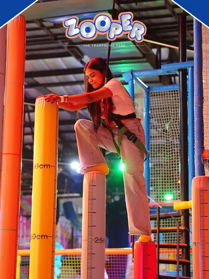 Testing balance and focus on the inflatable pillars. This activity requires concentration and is a favorite among kids and adults.