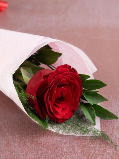 To complete your Valentine's gift, we tuck in a fresh, beautiful rose. It's the perfect finishing touch to a sweet surprise.