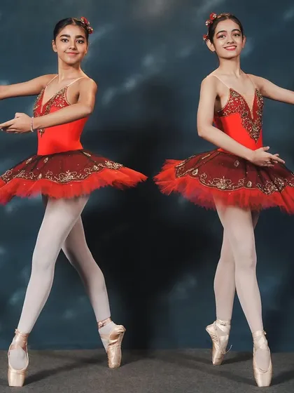 Our advanced students showcasing their pointe work on stage for the first time in 'La Fille Mal Gardée.' This was a huge milestone and a testament to their incredible hard work.