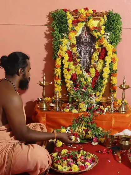 I prepare flower offerings for the morning puja. This act of devotion sets the tone for the day, reminding us that every action, no matter how small, can be an offering to the divine.