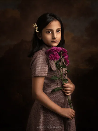 A slightly different crop of this painterly portrait, focusing more on her serene and thoughtful expression.