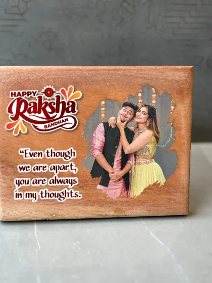 A rectangular wooden frame for Rakshabandhan, featuring a custom photo and a touching quote. This model is 8x6 inches and perfect for a tabletop display.