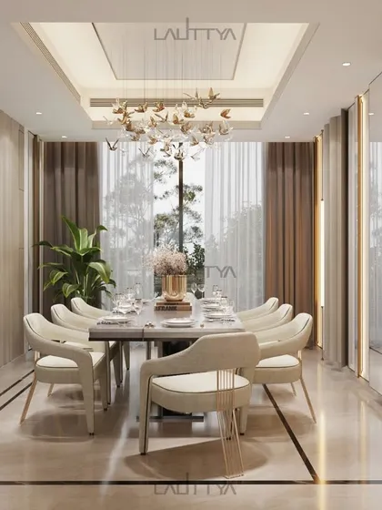 This dining space is a canvas of quiet luxury. Soft creams and beiges set a tranquil tone, layered with gold accents and rich textures. A sculptural chandelier cascades like a delicate artwork above the table.