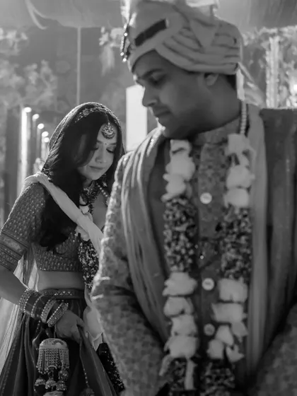 Saanya follows Aayush's lead during the last phera, a tradition where the groom steps ahead. This quiet, focused moment captures the essence of their partnership as they complete their wedding vows.
