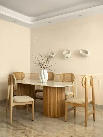 The full dining set, showcasing the harmony of natural materials and soft, neutral tones. It’s a space that embodies peace and ease.